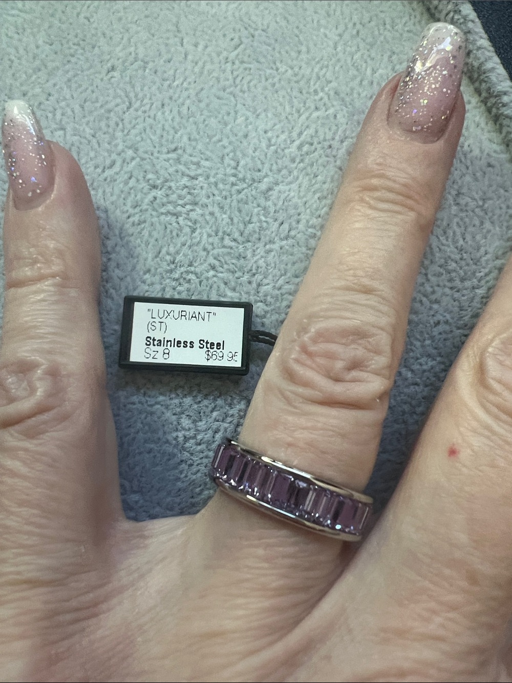 Luxuriant Stainless Steel Ring with Purple Baguette Stones